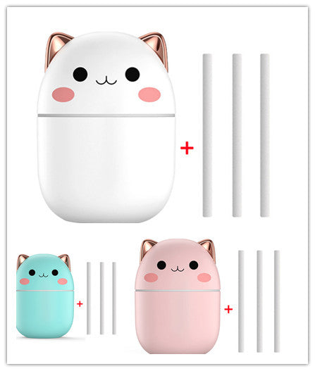 Bedside cat Air Humidifier with yellow, red, and blue LED night-light glowing while diffusing cool mist