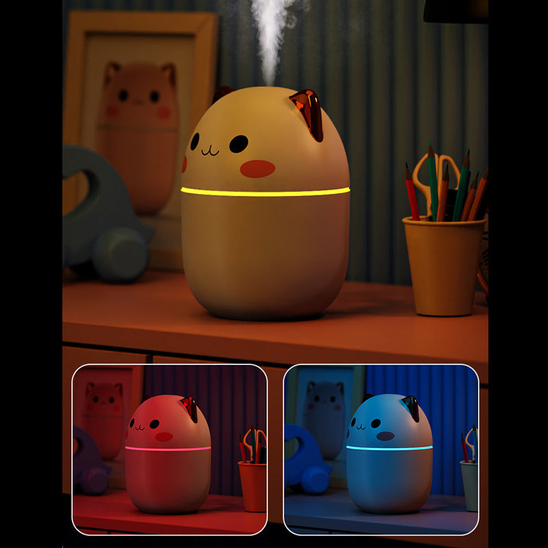 Cute multi-color LED cat Air Humidifier on nightstand, releasing cool mist—quiet USB-powered diffuser