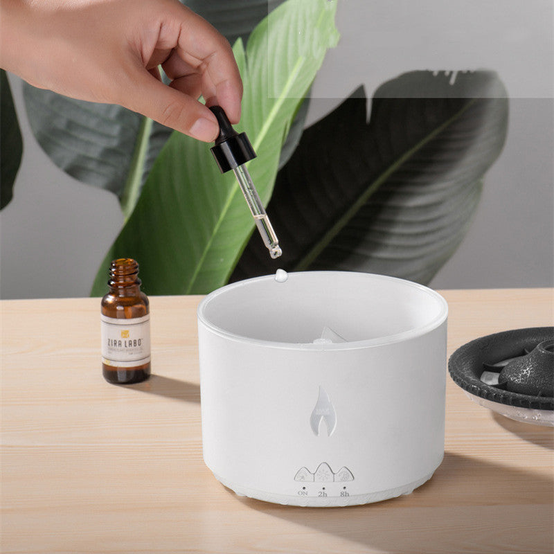 Air Humidifier reservoir being filled with essential oil dropper, highlighting aromatherapy feature.